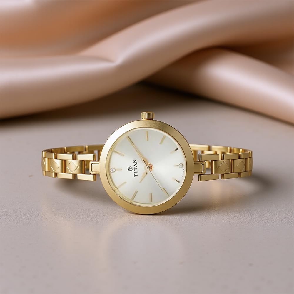 Titan Karishma Analog Champagne Dial Women's Watch -NM2598YM01 / NL2598YM01