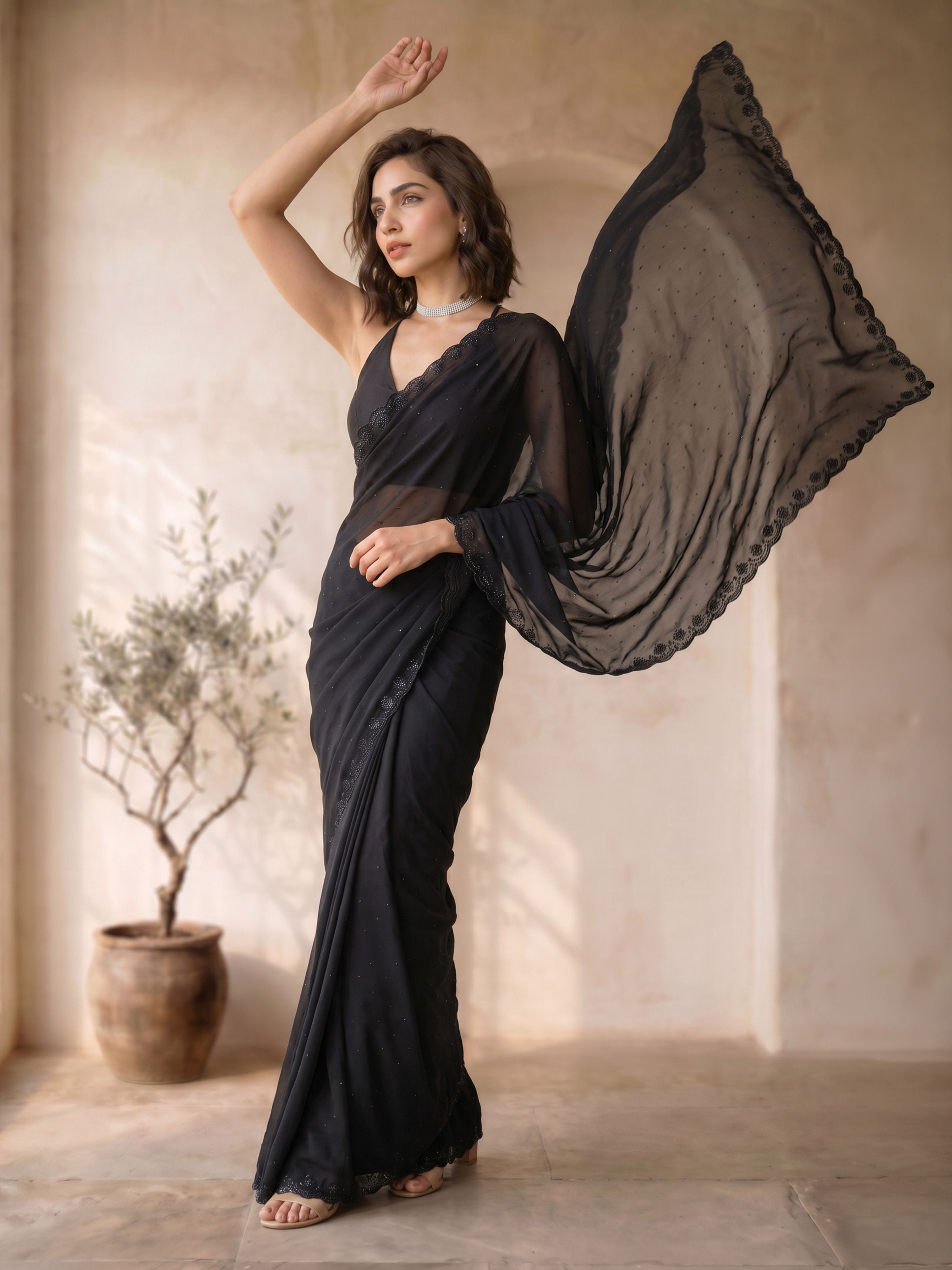 Women's Black Georgette Hem Design Saree With Unstitched Blouse Piece