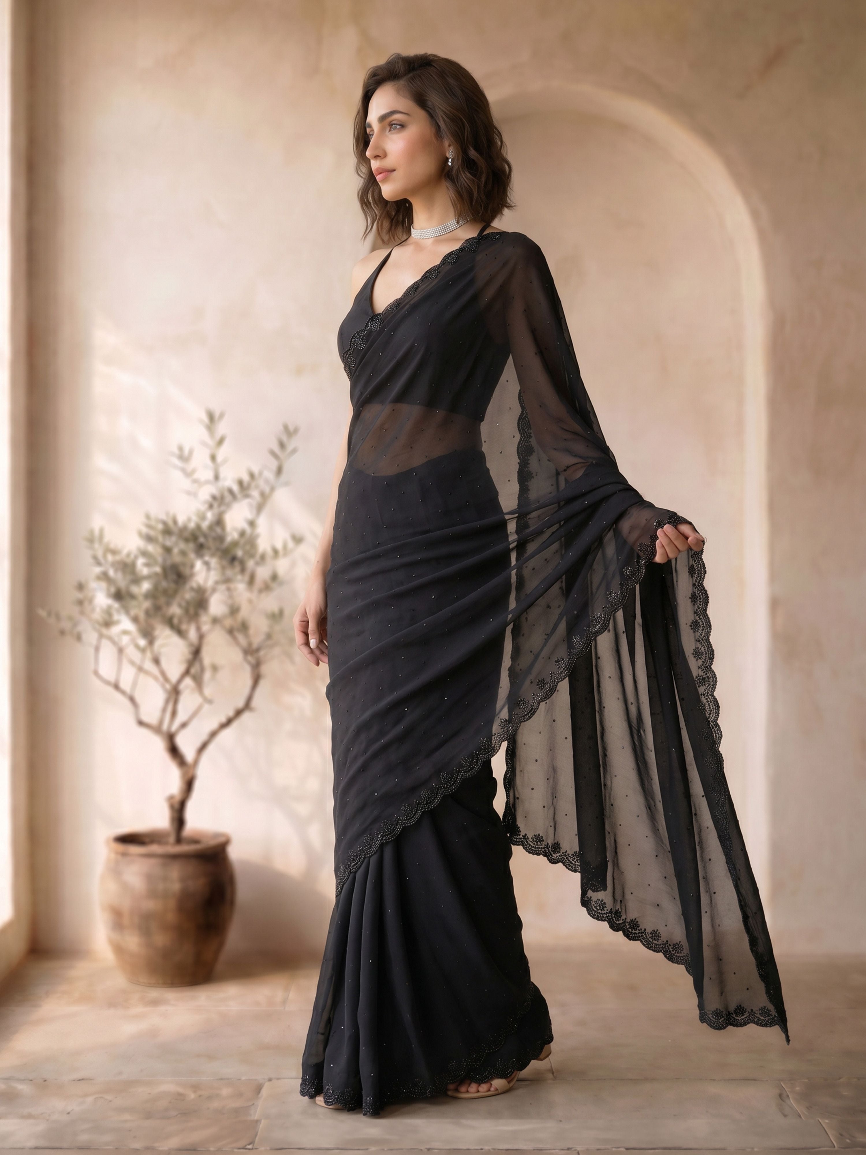 Women's Black Georgette Hem Design Saree With Unstitched Blouse Piece